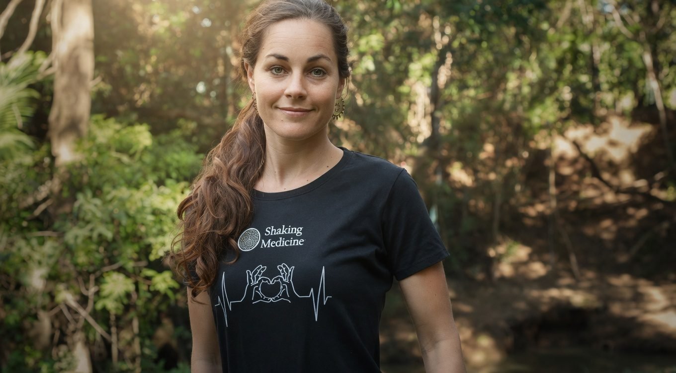 A Shaking Medicine student wearing the shirt — therapeutic shaking as a living practice.