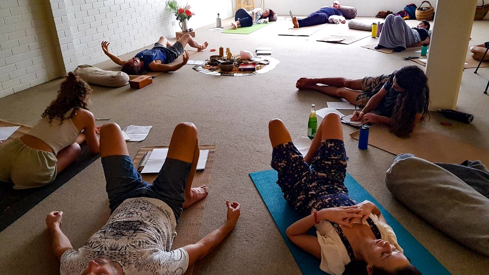 A Shaking Medicine class at rest — the nervous system landing after tremoring.