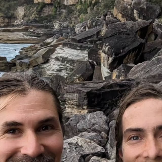 Keith and Truth Robinson on a rocky shoreline